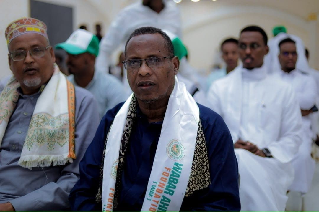 A community leader wearing the WAF sash